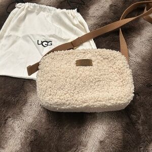 UGG Cream Sherpa Crossbody with Tan Strap. Has original bag it came in